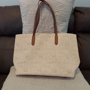 Ultra Beauty light pink tote bag over the shoulder